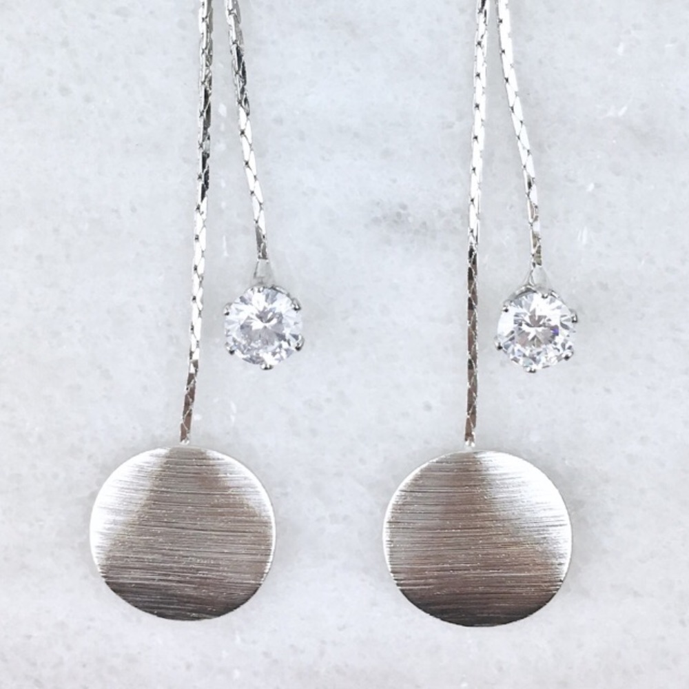 Silver dangle earrings with faux diamond and disc
